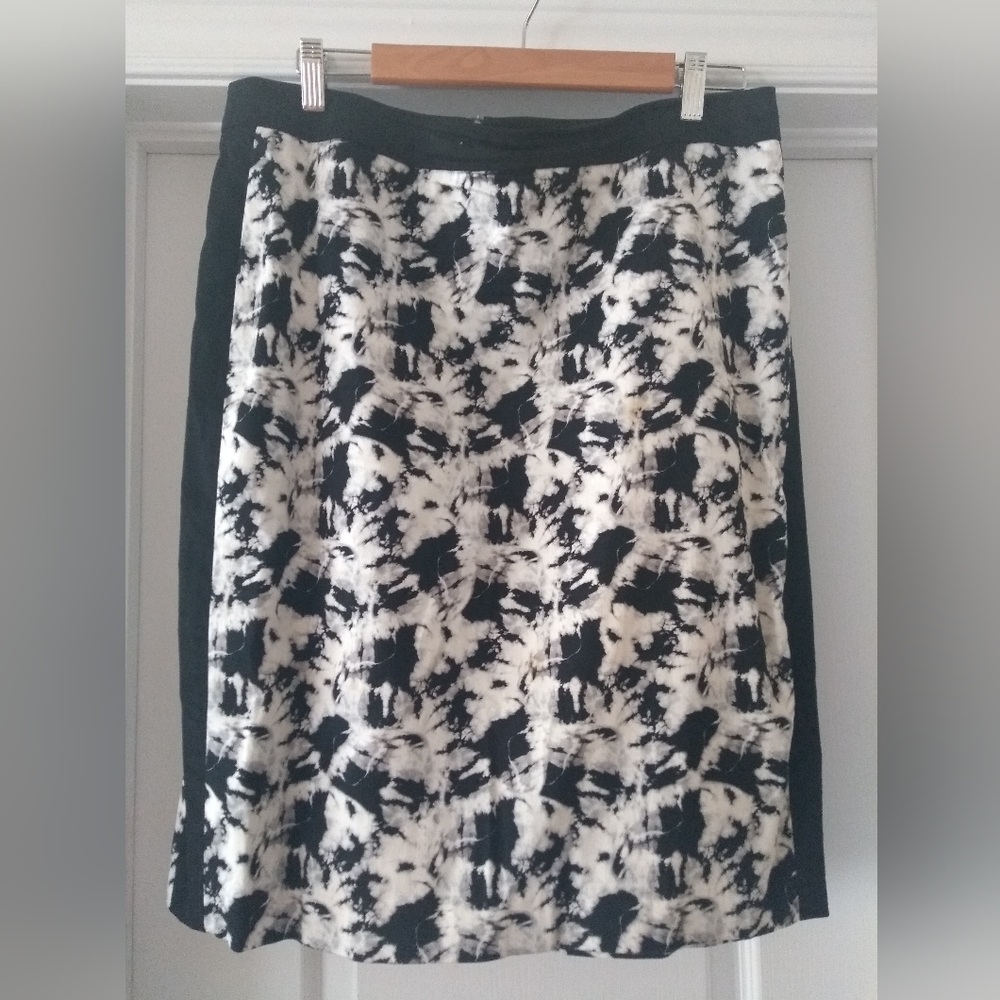 9. Alice Hope: Casual, midi skirt with a black and white marbled pattern.